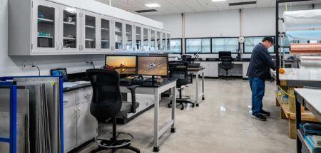 Lab with workbenches and computers