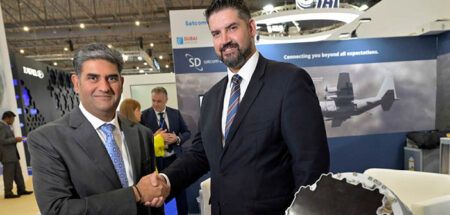 Paras Dhamecha and David Falberg shaking hands