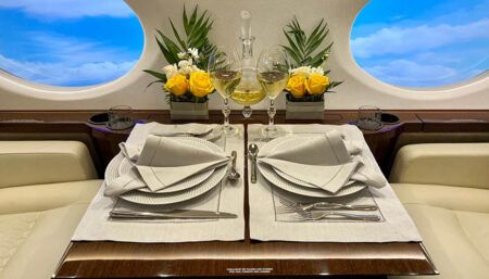 business jet conference table prepared for dining