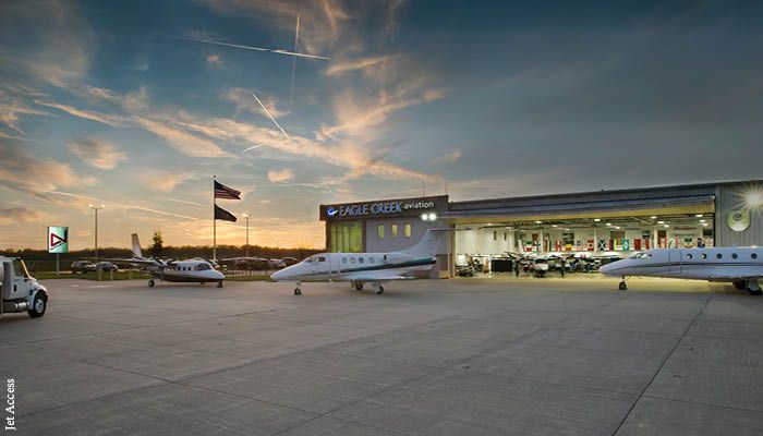 Business jets outside a hangar