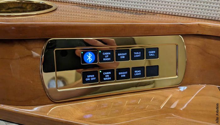 Control panel installed in business jet sideledge