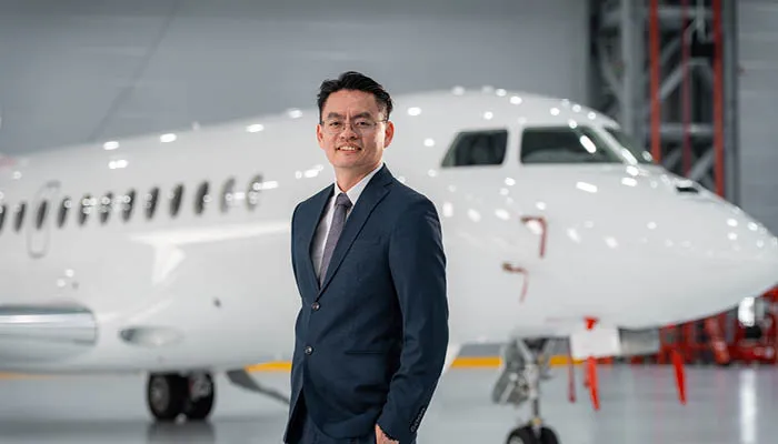 Portrait in front of aircraft