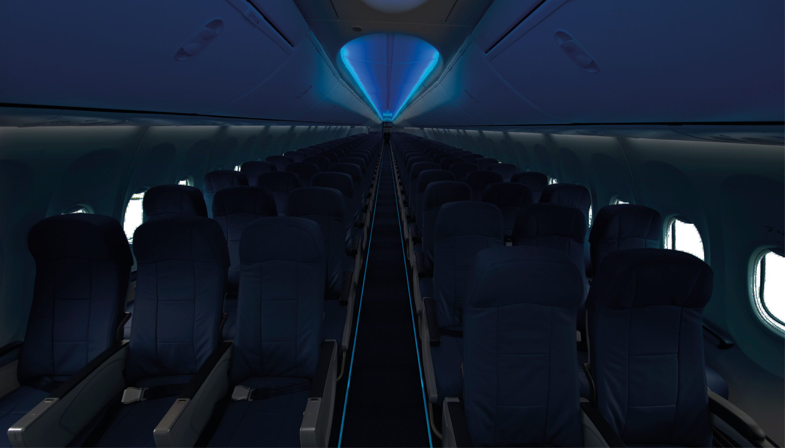 dark aircraft cabin with photoluminescent floor path marking strips