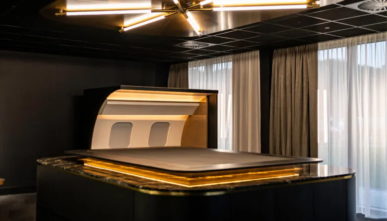 Table with half cabin section in background