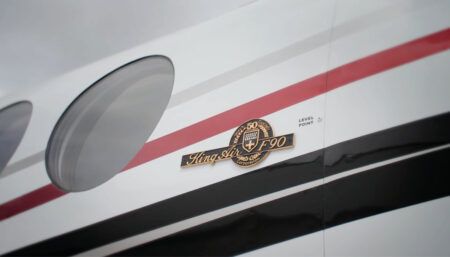 exterior of aircraft with King Air 90 plaque