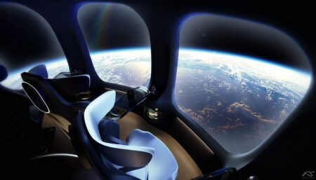 rendering of space capsule interior with big windows through which the Earth can be seen