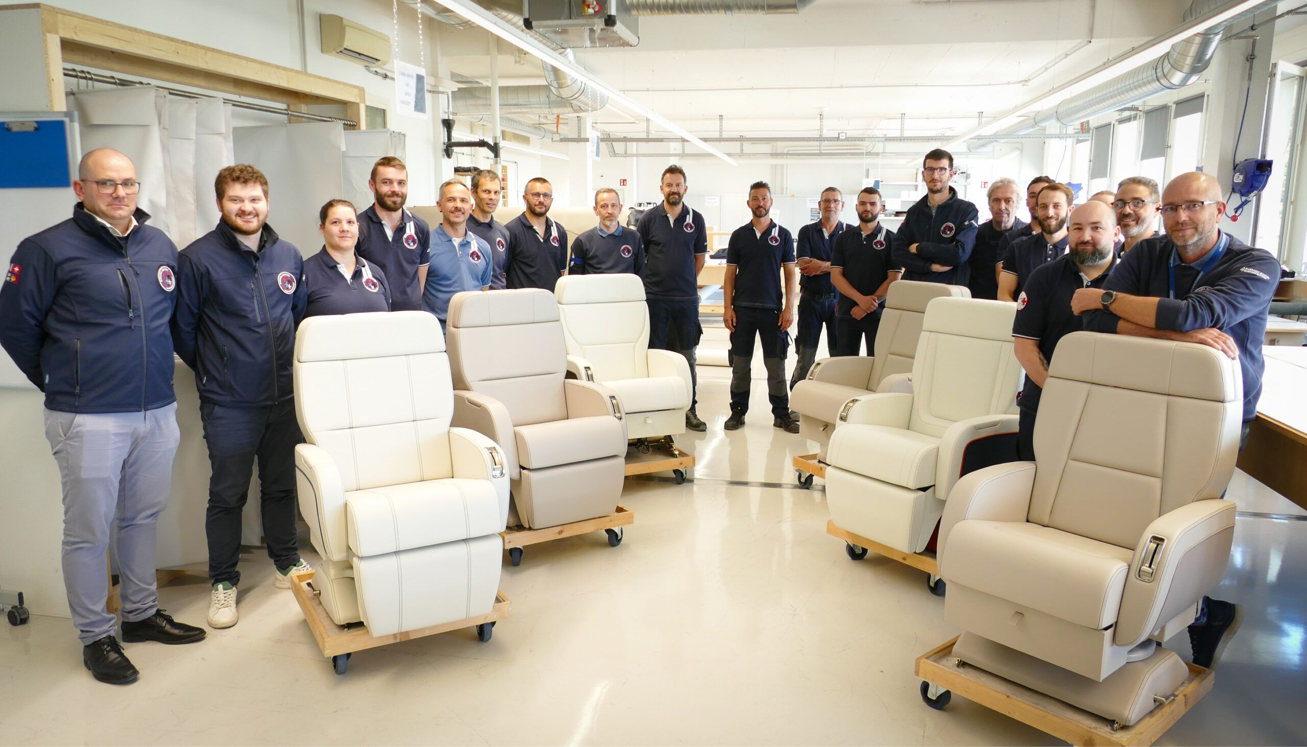 team photo with 6 seats in workshop