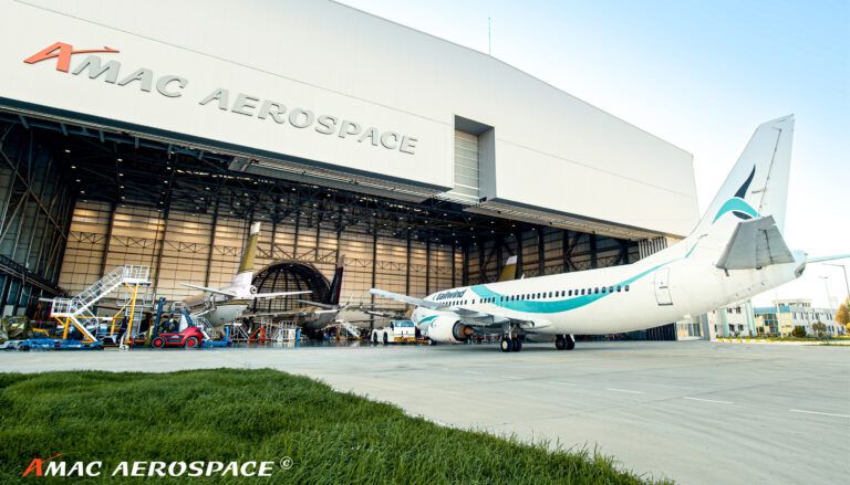 Hangar exterior with aircraft outside