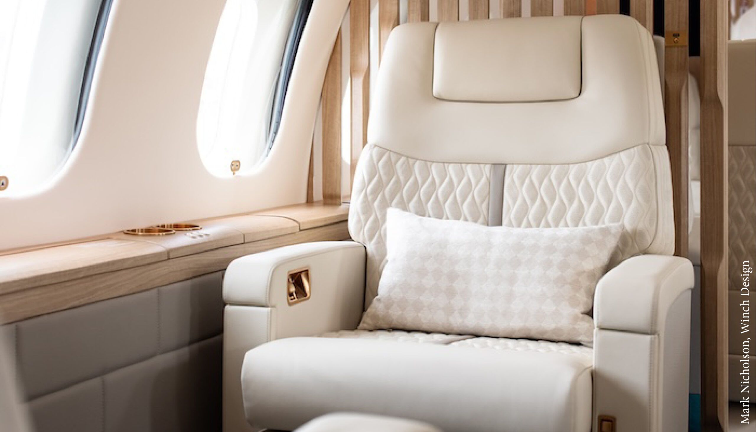 VIP aircraft seat in light-coloured upholstery