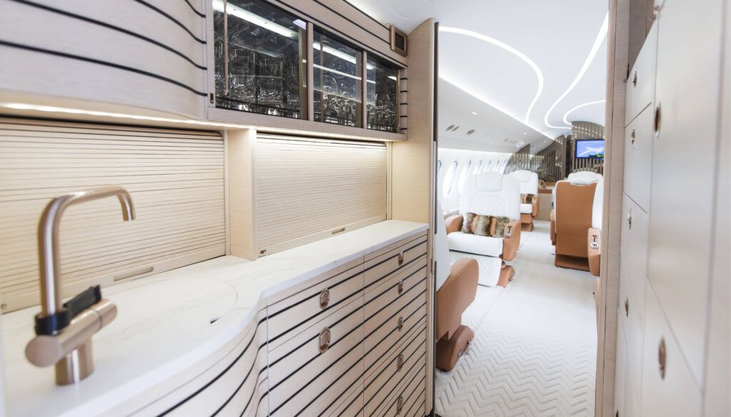 galley with light-coloured cabinetry with pinstripes