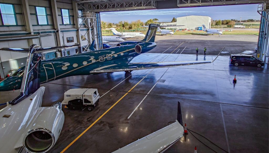 business jets in hangar