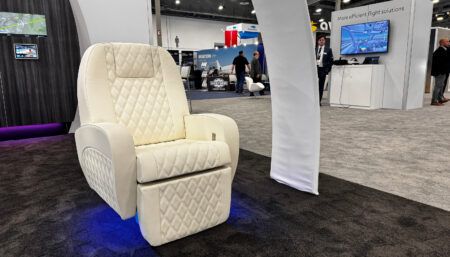 aircraft seat on tradeshow stand