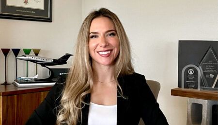 Natalie Rodríguez at a desk