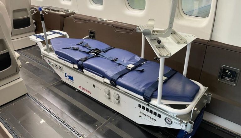 Air ambulance equipment including a stretcher in Pilatus PC-24 interior