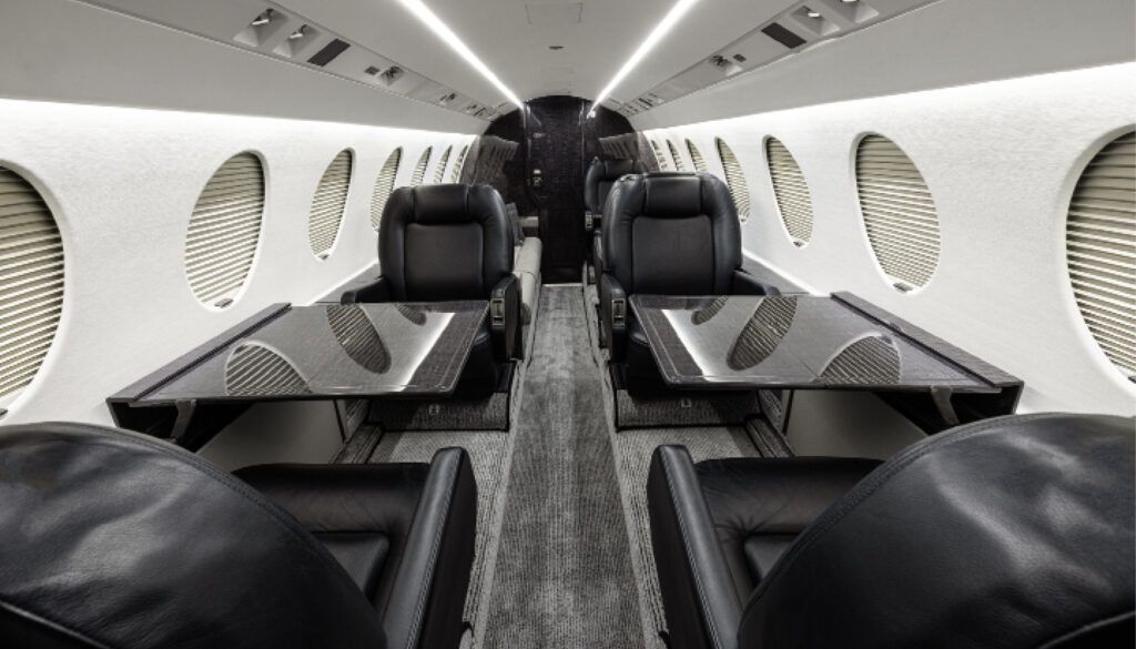 Falcon 50 interior - club-four seating and tables