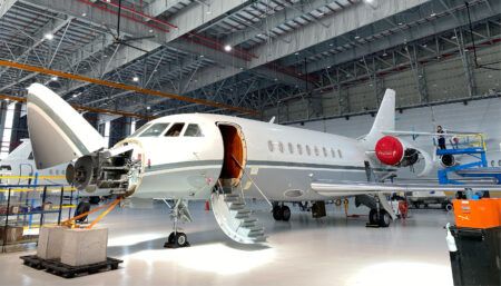 business jet in hangar facility