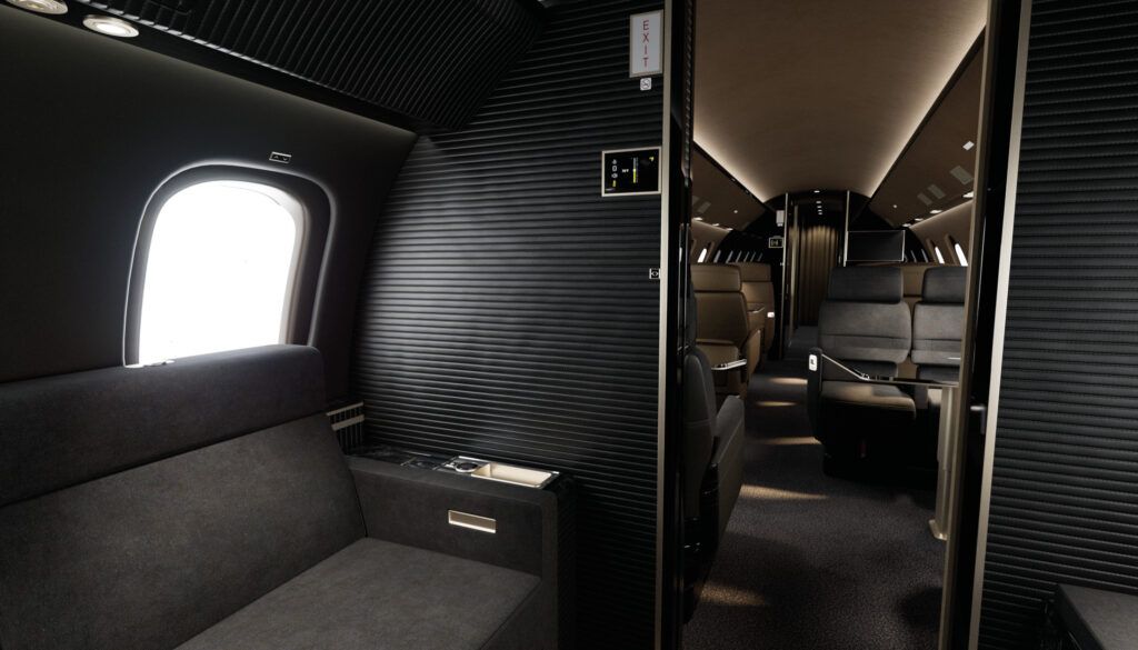 business jet interior with divan on left, looking into seating area