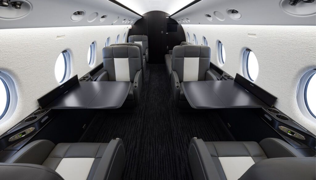 business jet interior with dark colour scheme