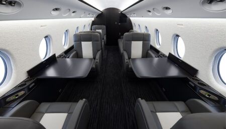 business jet interior with dark colour scheme
