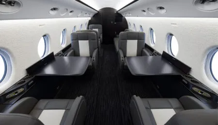 business jet interior with dark colour scheme