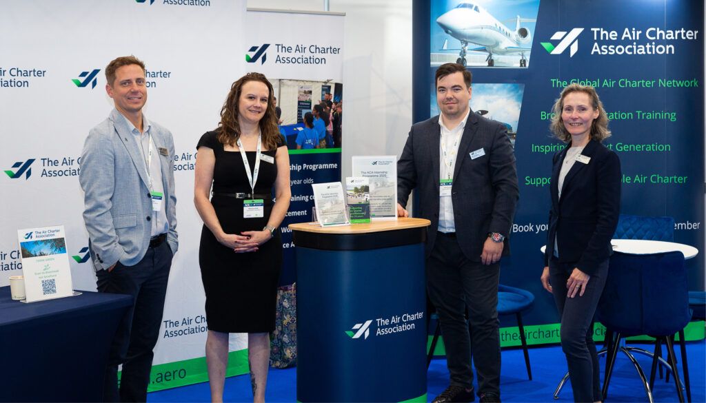 People on trade show stand
