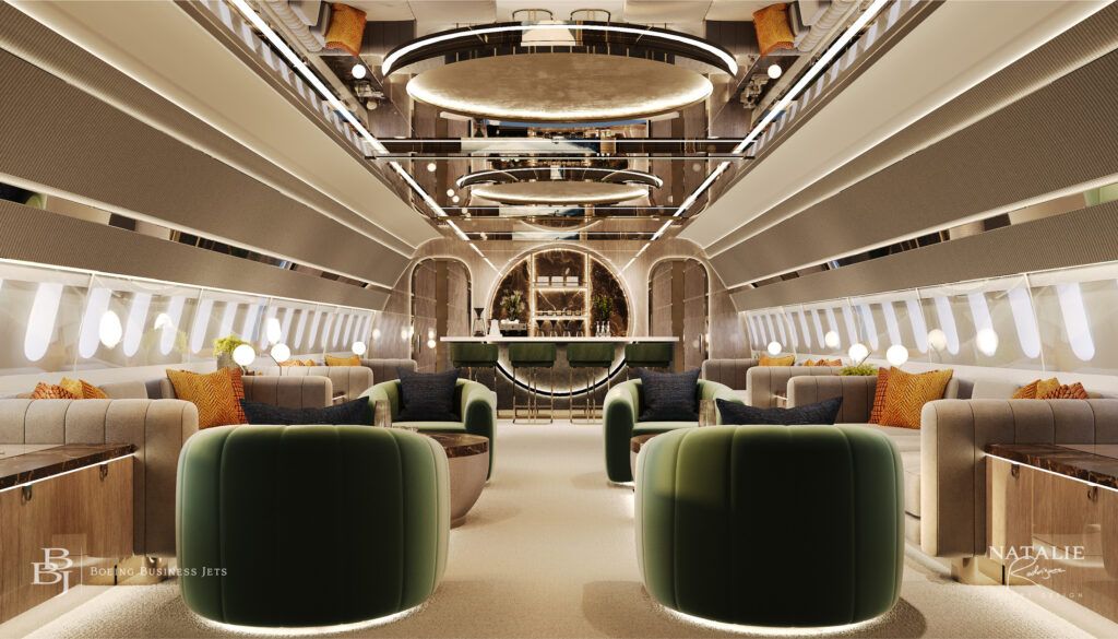 luxury aircraft lounge with symmetrical layout featuring green upholstered seating, divans and view towards bar at aft. Luminous circular element above.