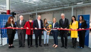 group in ribbon cutting ceremony