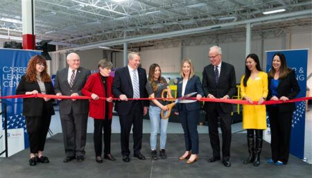 group in ribbon cutting ceremony