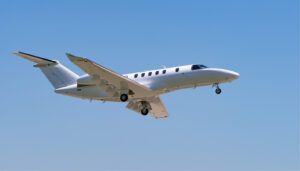 Business jet in air