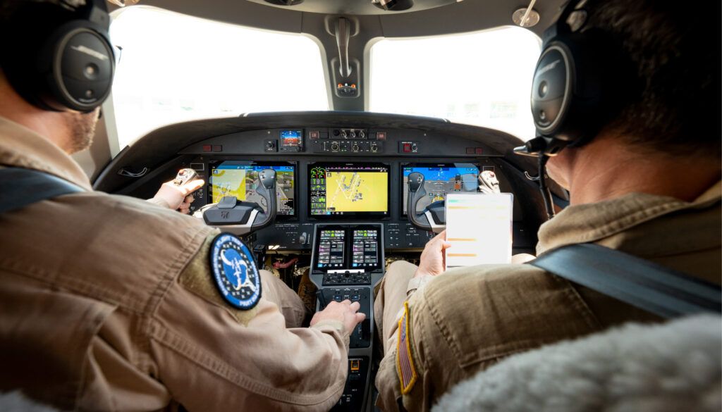 aircraft cockpit with two pilots