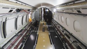 business jet with no interior fittings, sidewalls or carpet