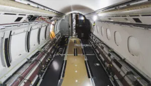 business jet with no interior fittings, sidewalls or carpet
