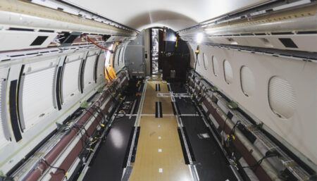 business jet with no interior fittings, sidewalls or carpet