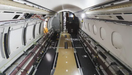 business jet with no interior fittings, sidewalls or carpet