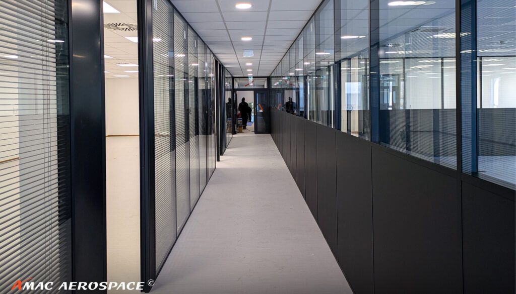 Interior of modern building, looking down corridor