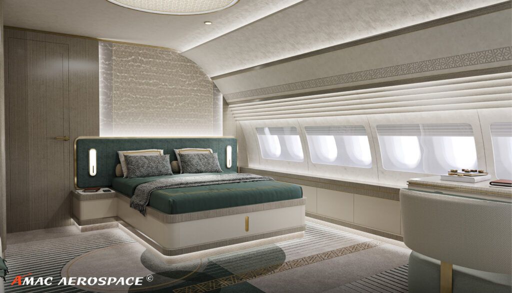 Bedroom on VIP aircraft interior, with large bed and luxury materials.