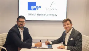 Aziz Turan and Dave Falberg sign the deal at EBACE 2025