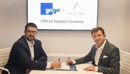 Aziz Turan and Dave Falberg sign the deal at EBACE 2025