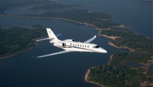 Private jet in flight over islands