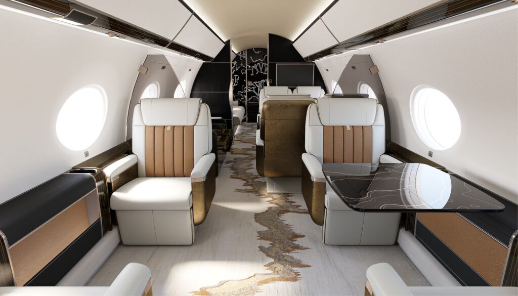 Modern jet cabin with cream leather seats, brown accents, and artistic carpet