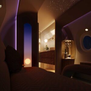 Modern aircraft cabin in night mode with soft yellow and purple lighting accents