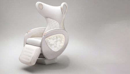 Pale blush VIP chair with curved headrest, quilted upholstery and pearl inlay