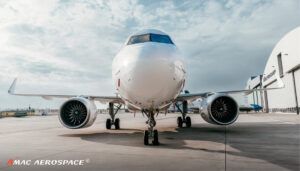 White aircraft on tarmac