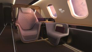 Private jet interior with sculpturally shaped main and companion seats