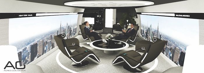 Modern seats around table in VIP aircraft with sidewall displays