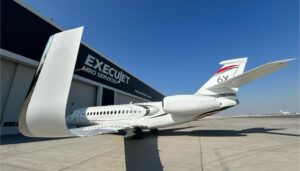 Private jet outside hangar facility