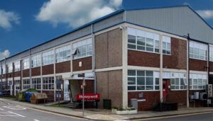 Industrial building with Honeywell signage and brick facade.