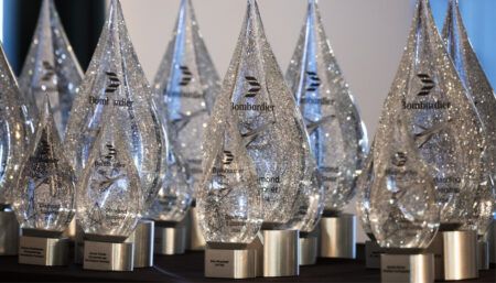 Crystal diamond-shaped awards with metallic bases