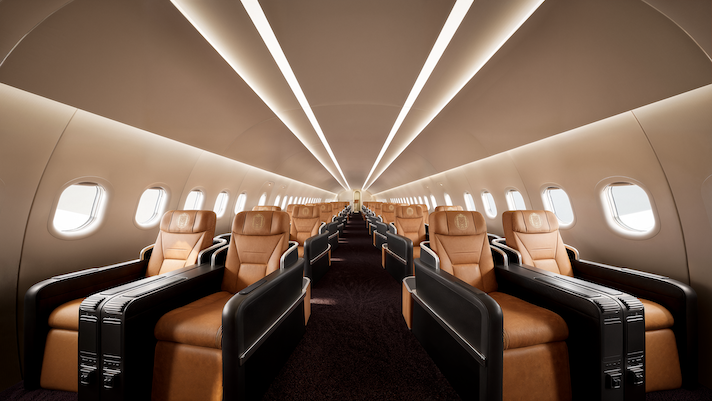 Luxurious aircraft cabin with tan seats and dramatic ceiling lighting