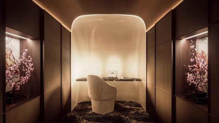 Secluded office area on private jet, with desk, chair and low lighting 